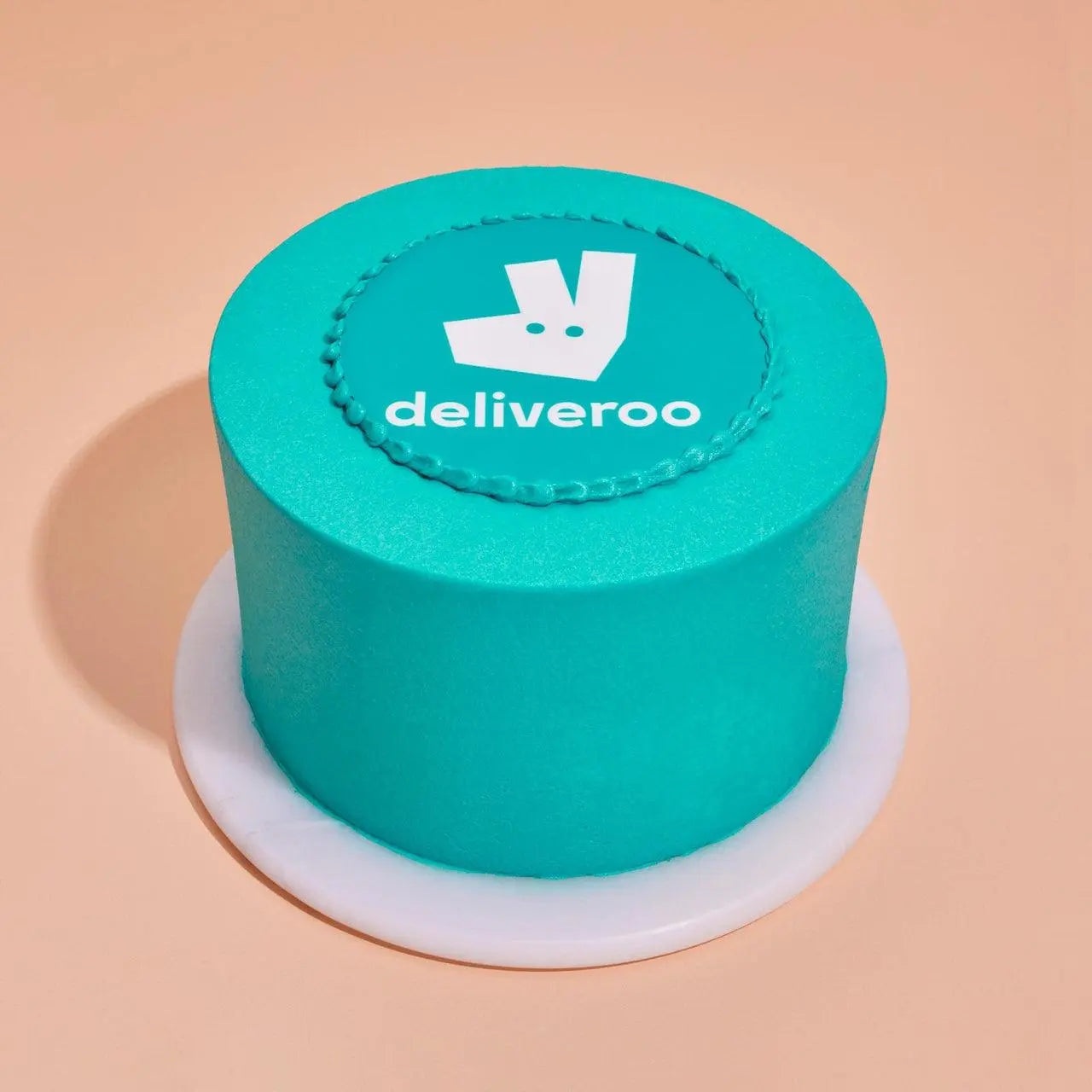 Colour matched cake with logo - Crumbs & Doilies